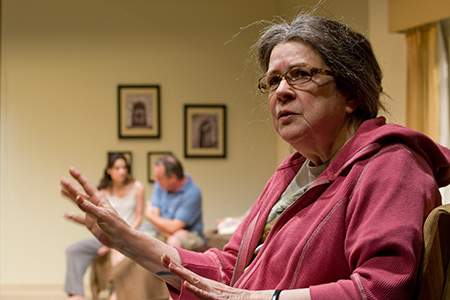 Ensemble members Kate Arrington and Tom Irwin (background) with Marylouise Burke