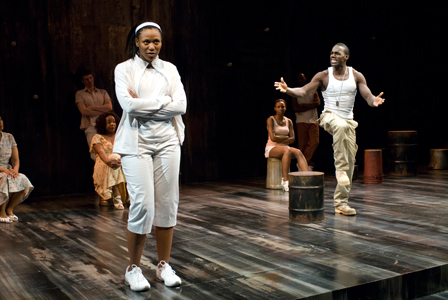 Ensemble member Alana Arenas with Rodrick Covington (foreground), Jeff Parker, Jacqueline Williams, Tamberla Perry and Phillip James Brannon (background)