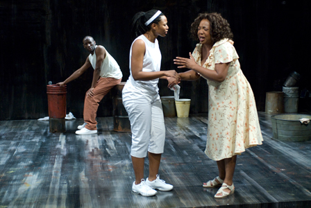 Ensemble member Alana Arenas with Jacqueline Williams (foreground), Phillip James Brannon (background)