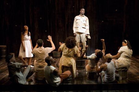 Ensemble member Alana Arenas with Rodrick Covington and the cast