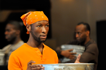 Phillip James Brannon(foreground), Rodrick Covington and ensemble member K. Todd Freeman(background)